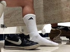 SUCKING COCK UNDER A SHOPPING CENTER BATHROOM