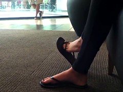 Candid Great feet in flip flops at mall