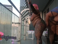 Ebony Lesbian Femdom Outdoors - big ass BBW babes toying on the balcony