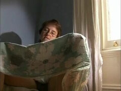 Old times redhead chick in glasses reads the book and masturbates hairy pussy