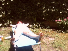 Nicoletta Sunbathes In A Public Garden Wearing A Big Dirty Diaper