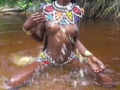 Zulu tribe chick with extraordinaire brilliant milk cans