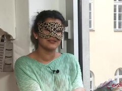 Shy MILF in mask talks about sex