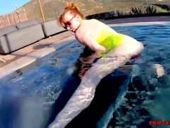 Sexy Red Xxx gets wild with a toy in the pool