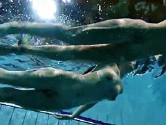 Two sexy amateurs showing their bodies off under water