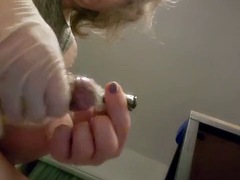 Filling a Condom Full of Cum with Sounding Rod Inserted