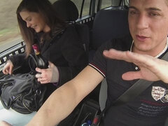 Leggy gf with an innocent look spreads her legs for a driver