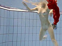 Sexy hot girl swimming in the pool