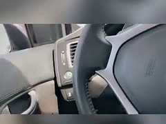 Busty milf solo in car