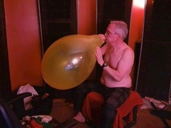 Rubber-loving guy with an average body indulges in his gay fetish