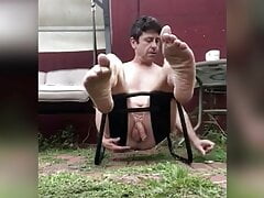 LiveNLove USES ASS SPREADING STOOL TO MASTURBATE OUTDOORS