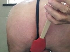 Beating tied cock and balls