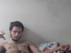 Laid in sofa stroking and smoking cigarrets alone.