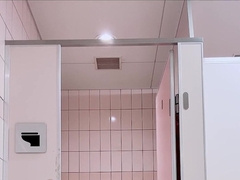 A lady-like fellow strokes in a public toilet