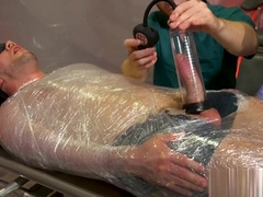 Restrained BDSM stud teased with sextoy