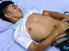 chinese twink Robin unwraps socks to lick feet while wanking