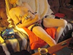 Oiled-up play with sex toy, BDSM device for solo pleasure