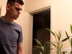 Kinky gay guy pissing in the bathroom and masturbating solo