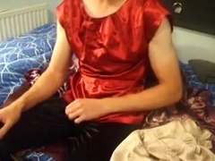 Cumming over red satin top
