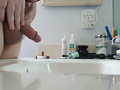 Cub Pissing in Bathroom Sink