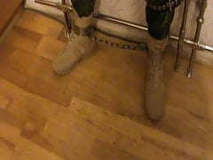 Straitjacketed slave is restrained to the grid