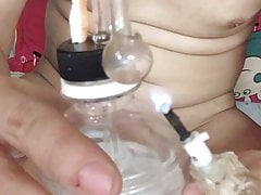 Vietnamese smoking and cock terrier alone