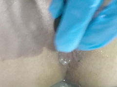 Onanism with rectal beads