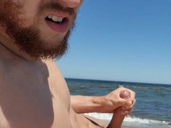Brainwashed gooner man jerks his weenie on public beach