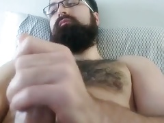 bearded guy cums in his beard