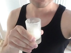 Drinking a cup of cum