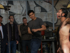 Chained male slave is waiting for his anal punishment