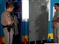 Hot jocks in cop uniform sucking