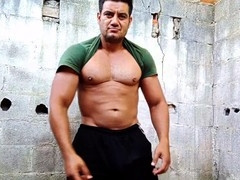 Muscular amateur star Yuri Gaucho showcases his hefty uncut cock for a steamy handjob