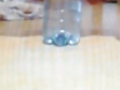 Bottle of water, again in my ass