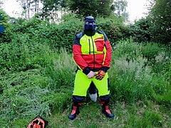 Forest Worker Pup pawing off in gear and boots (outdoors)