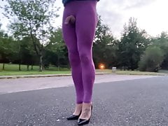 Public road walk in purple leggings .