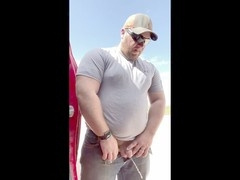 Construction workers relieve themselves