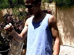 Handsome young jock tugs on his big cock solo outdoor