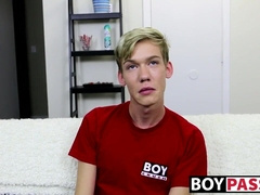 Twink laying alone and stroking cock before using toy