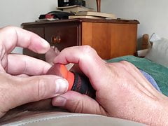 Foreskin with bat and pin, and phone