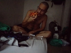 gainer gobbling a large slip of pizza