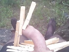 Slave with pantyhose, clothespins on cock and double cumshot