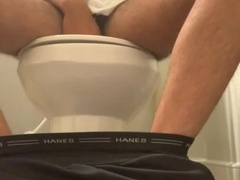 Soldier tugging off on wc