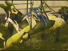 Hogtied bikerslave is suspended