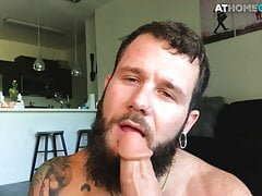 Inked otter sprays cum after stuffing his ass with a dildo