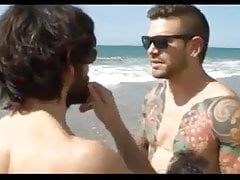 spanish tat guy wanks with his mate to a full load