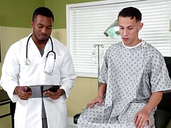 Submissive patient is examined by the black doctor