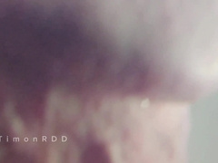 The boy shoots a load in a rubber with super hot water with strong volleys