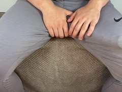 Enormous dick unloads freely in trousers