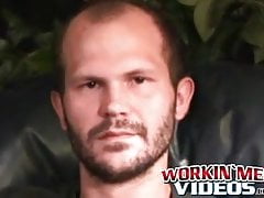 Stud passionately tugs on his huge dick after an interview
